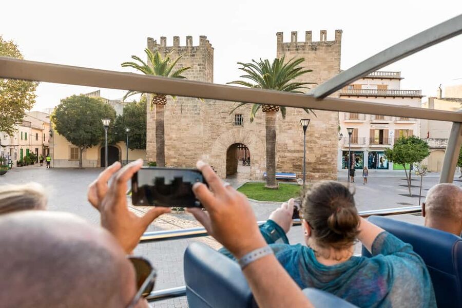 Alcudia: ALCUDIA City TOUR Open Top Bus, open-top bus tour - Open-top views: resorts, port area, and the Aucanada lighthouse stop