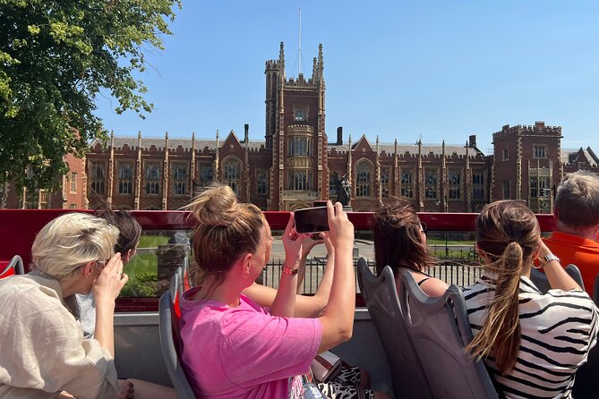 Belfast Hop-on Hop-off Tours - Falls and Shankill murals: Peace Wall, Spectrum Centre, and St Peter’s Cathedral