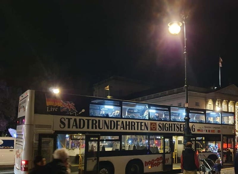 Berlin: Bus Tour by Night with Live Commentary - Alexanderplatz: the Red Town Hall and World Clock moment