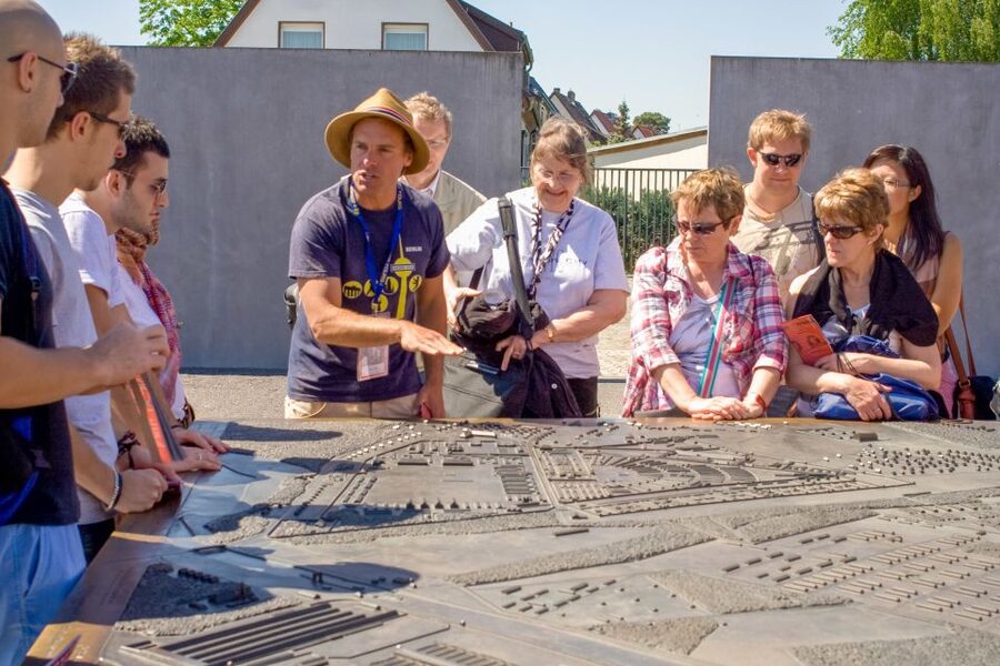 Berlin: Sachsenhausen Concentration Camp Bus Tour in English - The worst parts of Sachsenhausen: crematoria, isolation cells, and the machinery of death