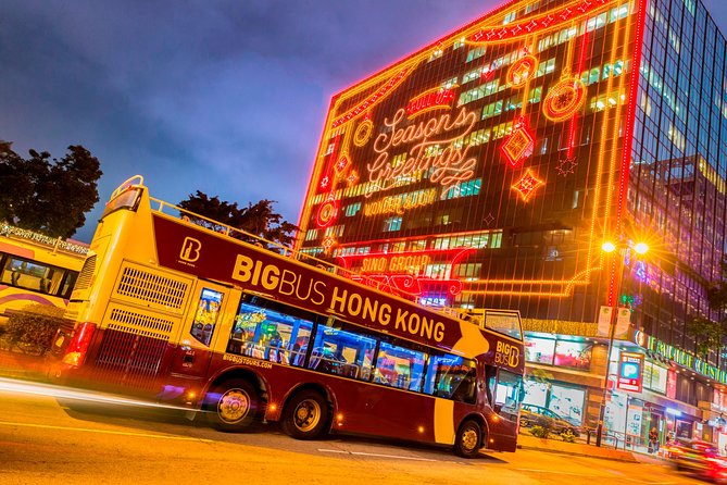 Big Bus Hong Kong Panoramic Night Tour by Open-Top Bus - Clock Tower, fruit market stops, and quick landmark moments