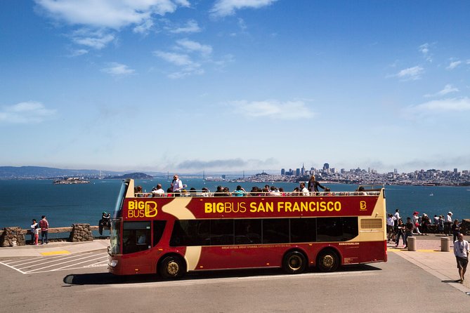 Big Bus SF: Hop-on Hop-off Tour with 17 Stops and Sunset Option - Riding comfort: seats, open deck, and wind on the bridge