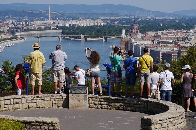 Budapest: 3-Hour Live-guided Bus Tour and 1-hour River Cruise - Pest-side icons from the bus: Parliament, State Opera, and St. Stephen’s Basilica