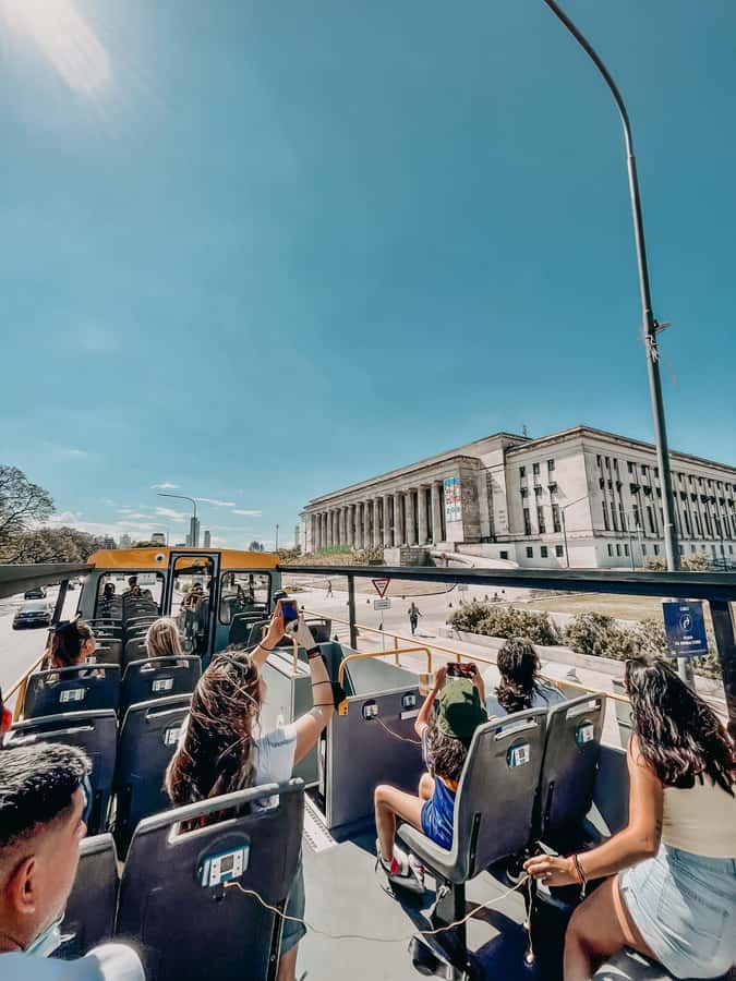 Buenos Aires Hop-On Hop-Off Bus and Exclusive Benefits - Audio guide in 9 languages: helpful context, with a few quirks