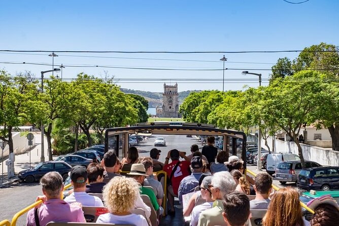 City Sightseeing Lisbon Hop-On Hop-Off Bus Tour & Bookable Extras - Before You Ride: Tickets, Headphones, and Route Timing