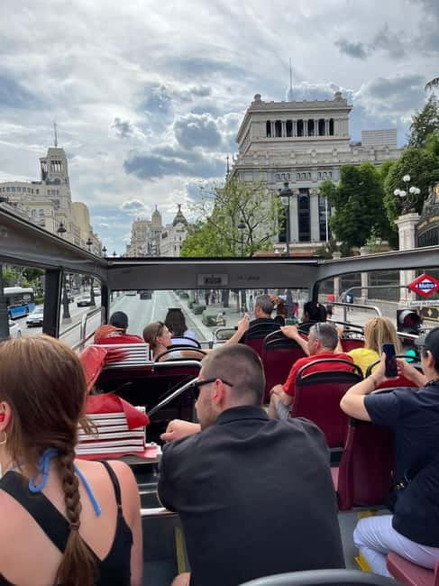 City Sightseeing Madrid Panoramic Bus Tour & Bookable Extras - Discounts and partner add-ons: Flamenco, luggage storage, scooters, and more