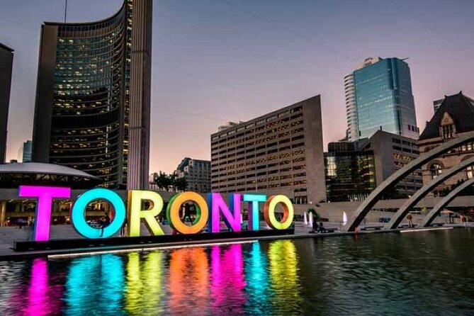 City Sightseeing Toronto Guided Night Bus Tour - Financial District Skyscrapers Shimmering in Moonlight
