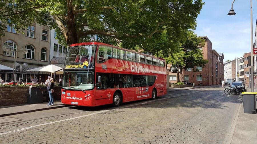 Cologne: 24h Hop-On Hop-Off Sightseeing Bus Ticket - Audio guide listening tips: German speaker overlap is real