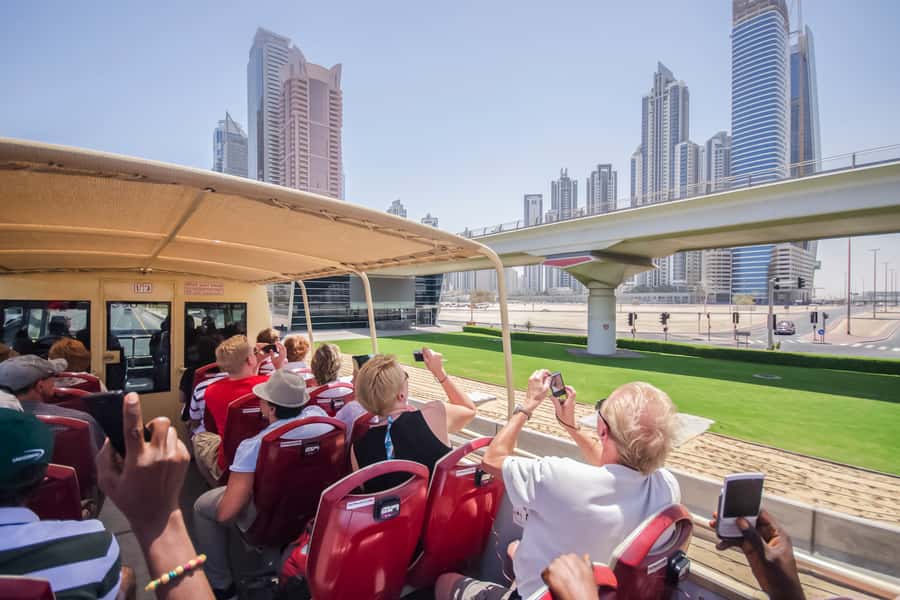 Dubai: Big Bus Hop-On Hop-Off Tour & Optional Dhow Cruise - Desert Sunset Tour from the Dubai Mall: forts, animals, and henna