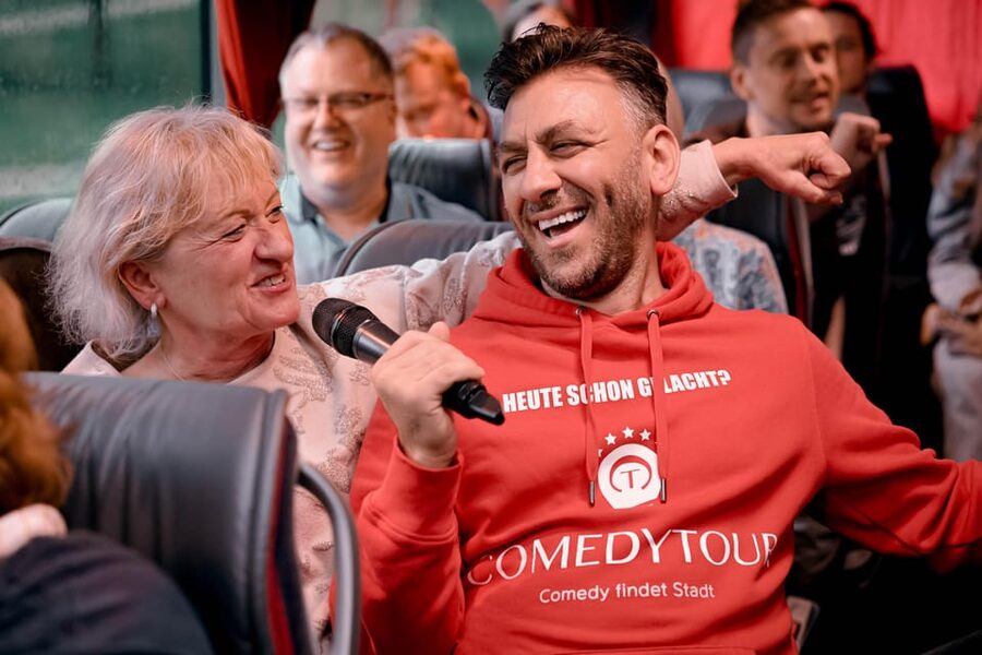 Düsseldorf: 1.5-Hour Comedy Bus Tour - Around-the-Clock Reality Checks: Rules, Drinks, and Comfort