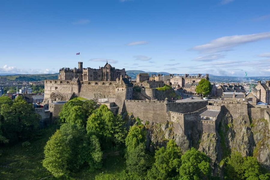Edinburgh: Hop-On Hop-Off Bus Tour with Live Guide - Boarding at Waterloo Place and the Upper-Deck Advantage