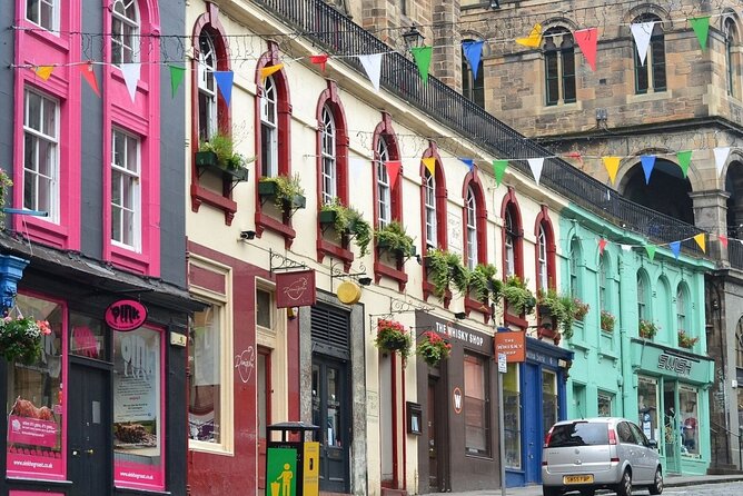 Edinburgh Rail Trip from London with Castle entry and Hop-on Hop-off bus - Princes Street and the New Town side: photos, shopping street energy, and quick skyline relief