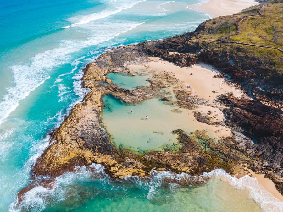 From Hervey Bay: K'gari, Fraser Island Two-Day Coach Tour - Hammerstone Sandblow and Lake Wabby: sand dunes and swim time
