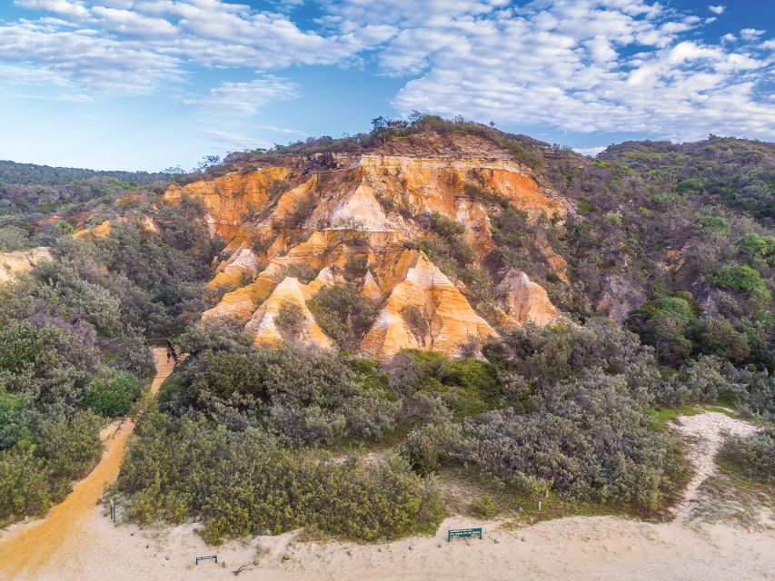 From Hervey Bay: K'gari, Fraser Island Two-Day Coach Tour - Day two: Indian Head, 75 Mile Beach cruising, and the ferry back at 5:00 PM