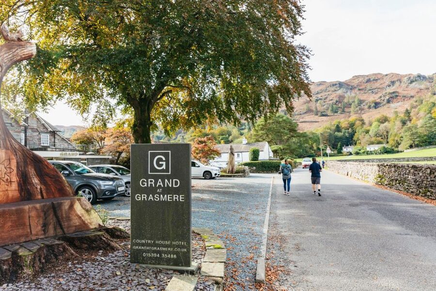 From Manchester: Lake District Bus Tour & Windermere Cruise - Coniston Water: the photo stop that changes your idea of size