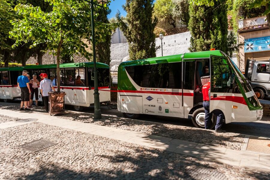 Granada City Train 1 or 2-Day Hop-On Hop-Off Ticket - Comfort Notes: Cobblestones, Noise, and the Simple Headphones Fix