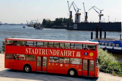 Hamburg Hop-on Hop-off Sightseeing Tour on Red Double Decker Bus - The audio setup: English access, but watch the German volume overlap
