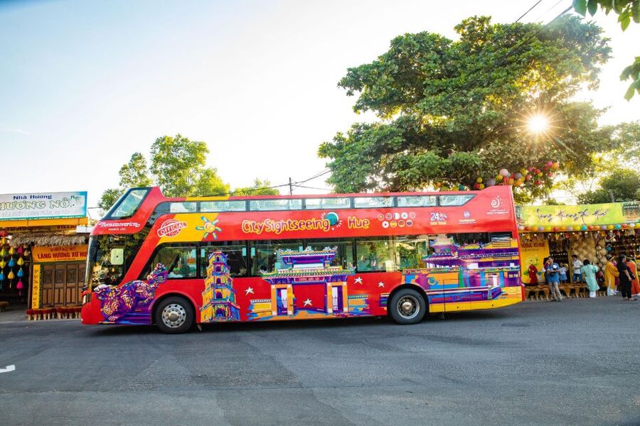 Hue: City Sightseeing Hop-On Hop-Off Bus Tour - Audio guide reality: multilingual help, plus the rainy-day issues