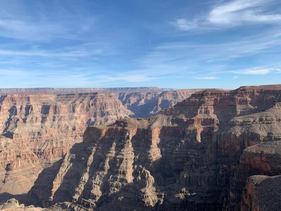 Las Vegas: Grand Canyon West Bus Tour with Guided Walk - Hoover Dam and Dinner on the Return Trip