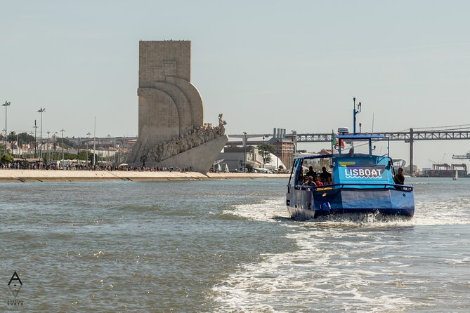 Lisbon Hop On Hop Off Bus and Boat Tour - 25 de Abril bridge area: Pilar 7 stop and the river big-sky moment