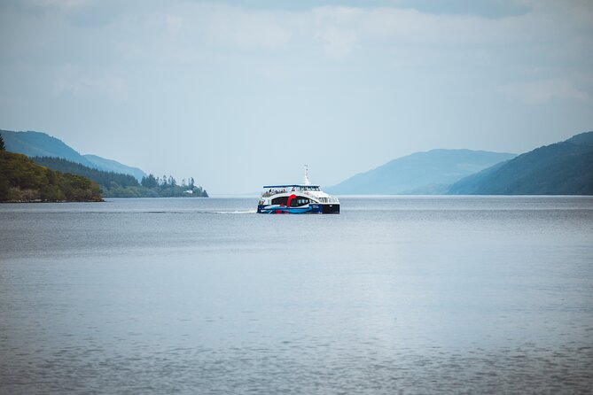 Loch Ness and the Highlands Experience Bus Tour from Edinburgh - Kilmahog: a quick Highland break with shop coffee and a big Highland cow