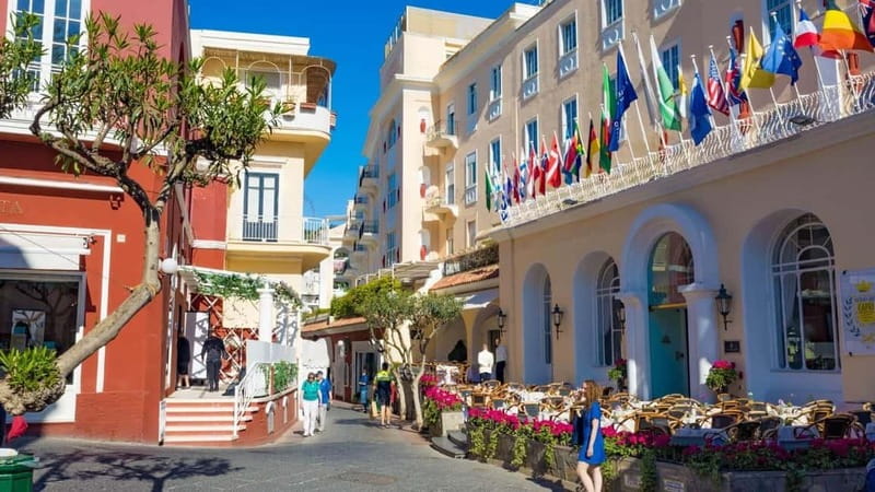 Marina Grande: Guided Capri Island Hop-On Hop-Off Bus Tour - Capri town stop at Piazzale Europa: Piazzetta, Via Camerelle, and Augustus Gardens
