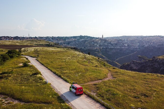 Matera Official Open Bus Tour with entrance to Casa Grotta - Castello Tramontano viewpoint: the orientation stop that saves your legs later