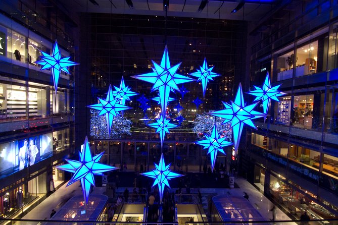 New York City Holiday Movie Sites and Lights Bus Tour - Rockefeller Center and the classic finish at Bryant Park Holiday Market