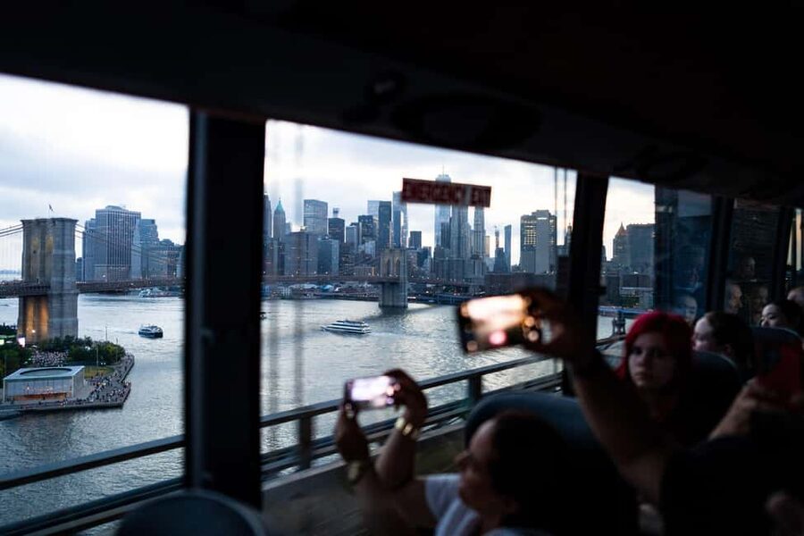 NYC at Night: 3-Hour Luxury Bus Tour of Top Highlights - Midtown first: Fifth Avenue, Rockefeller Center, and St. Patrick’s at night