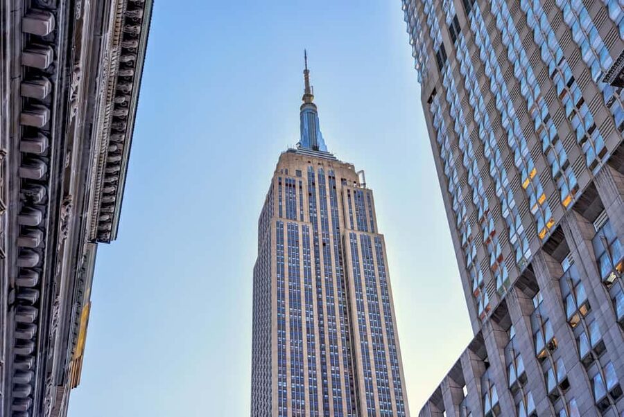 NYC: Half-Day Bus Tour of Top Highlights - Financial District and Charging Bull: iconic spots with quick, punchy context
