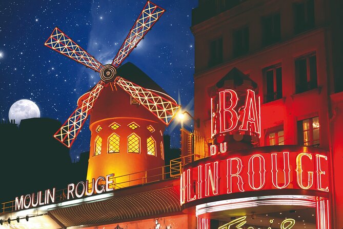 Paris Lights Evening Bus Tour with Eiffel Tower Summit Option - Vendôme, Opéra, and the Louvre stretch: a classic Paris postcard route
