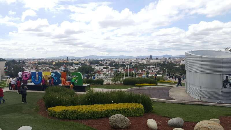 Puebla: Hop-On Hop-Off Bus Tour with Audio Guide - Analco neighborhood stop: flea market energy on weekends