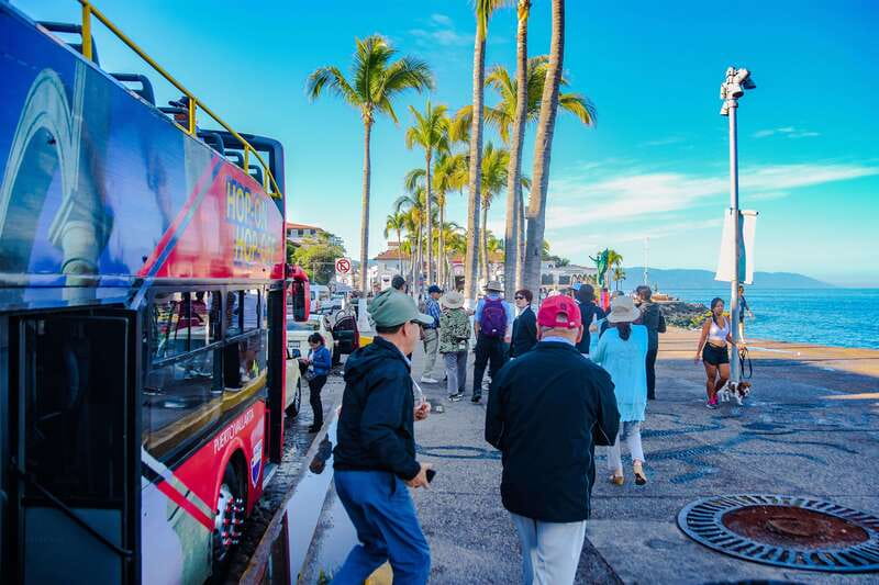Puerto Vallarta: Hop-On-Hop-Off City Bus Tour - Bilingual history on headphones: how the audio guide works in practice