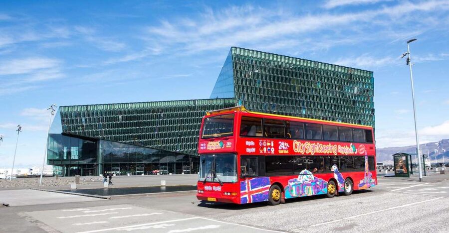 Reykjavik: City Sightseeing Hop-On Hop-Off Bus Tour - Vouchers, headphones, and the reality of boarding