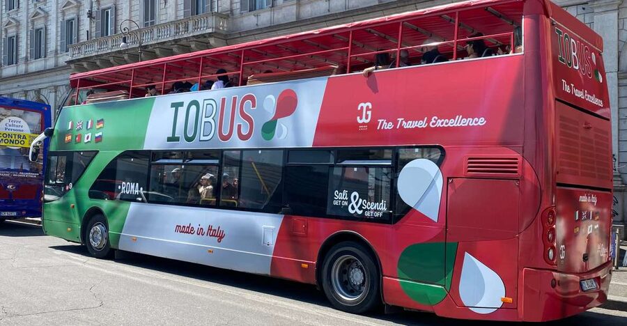 Rome: Hop-On Hop-Off Open-Top Bus City Tour - The ride experience: audio guide on your phone + free Wi‑Fi