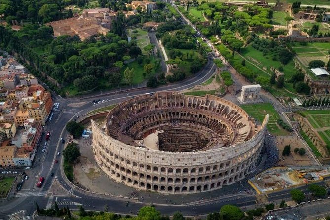 Rome Panoramic Bus Tour & Colosseum Arena Visit with Audio Guide - What Makes the Colosseum Part Feel Worth It