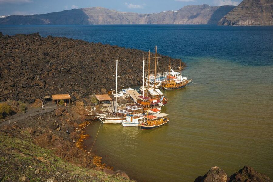 Santorini Island Bus Tour and Caldera Sunset Cruise - Nea Kameni and Palea Kameni: volcano crater and sulfur springs