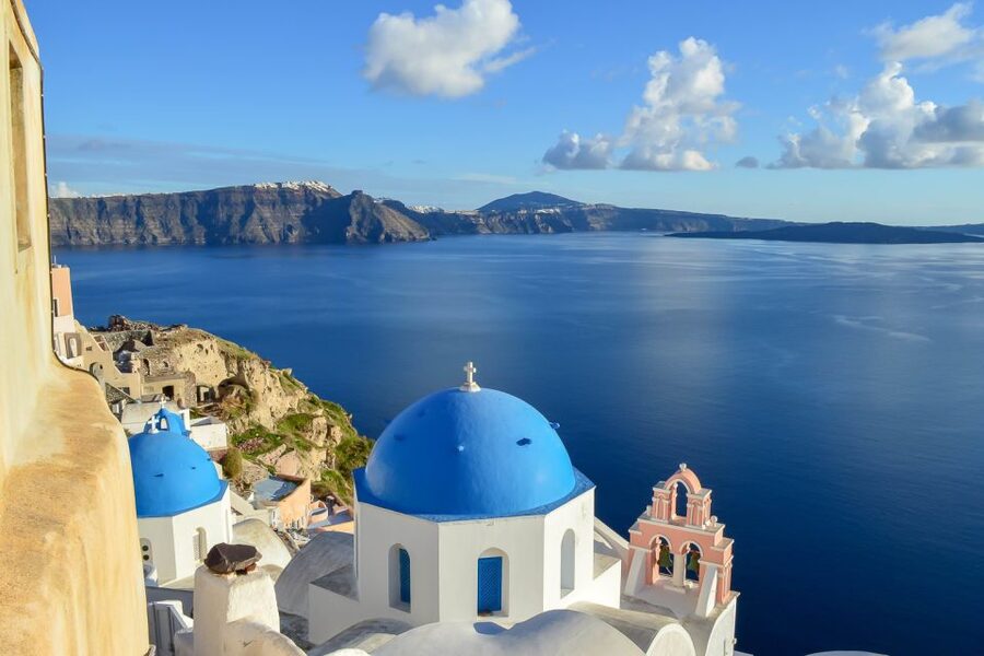 Santorini: Traditional Sightseeing Bus Tour with Oia Sunset - Perissa black sand beach: swim time and a lunch break