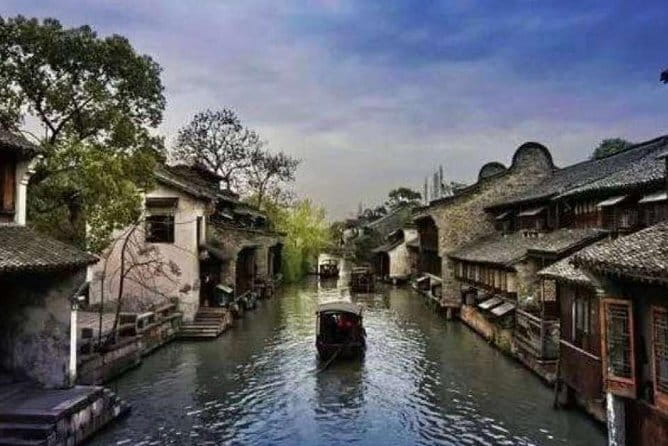 Shanghai Yu Garden, The Bund & Zhujiajao Water Town Bus Tour - Old Street Bazaar time: Tea shop optional, shopping-friendly pace