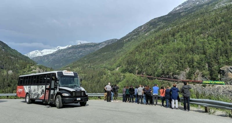 Skagway: Klondike Highway & Yukon Bus Tour with Husky Kennel - Crossing into British Columbia: Tormented Valley, Summit Lake, and Customs