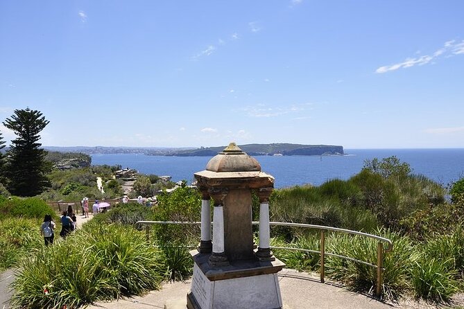 Sydney Guided Sightseeing Bus Tour - Potts Point to Double Bay: a ride through style, signage, and coast