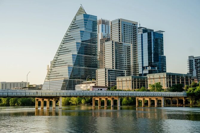 Tea Around Town Austin: Elegant Tea Bus Tour and Treats - A 1915 theater marquee and a modern event space