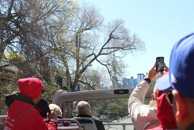 Toronto Hop-On Hop-Off Bus Tour with Scenic Boat Cruise - Guide style, narration, and how to get more from the ride