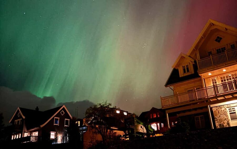 Tromsø: Northern Lights Bus Tour – Chase the Aurora Borealis - Inside the Heated Coach: Comfort, Stories, and Noodles