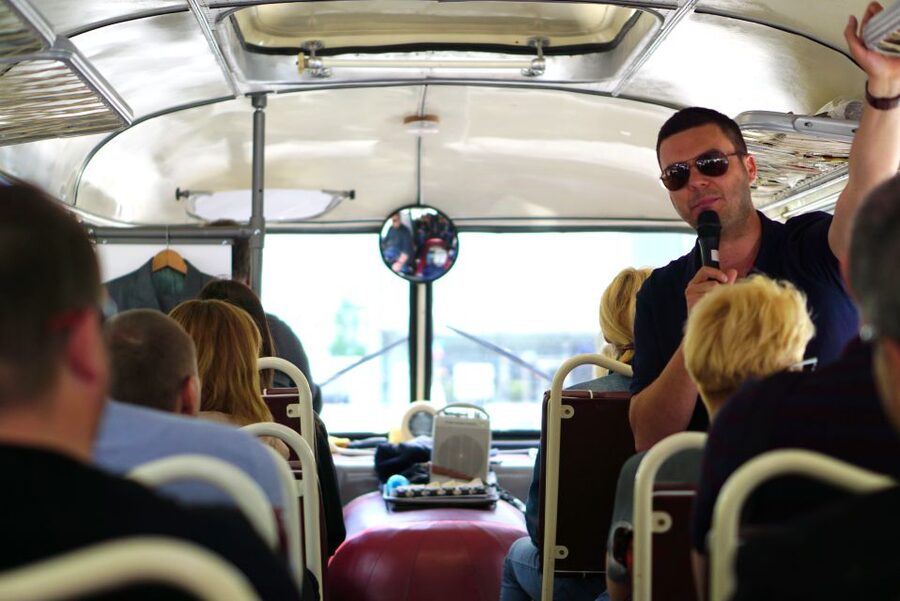 Warsaw: Highlights Guided Retro Bus Tour - Palace of Culture and Science again: why the same landmark hits differently