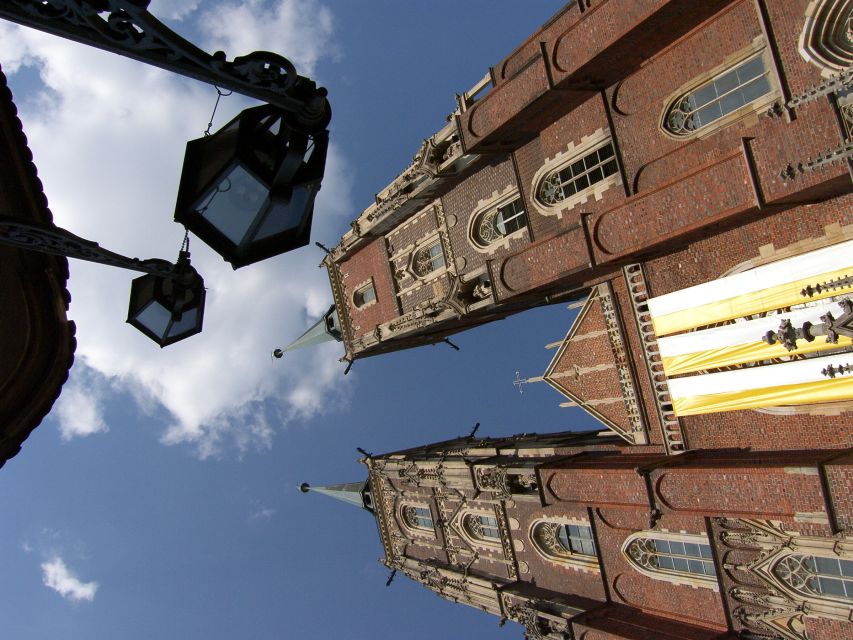 Wroclaw: 2-Hour Private Electric Bus Tour with Guide or Tape - University of Wrocław, Fencer’s Fountain, and the Student Angle
